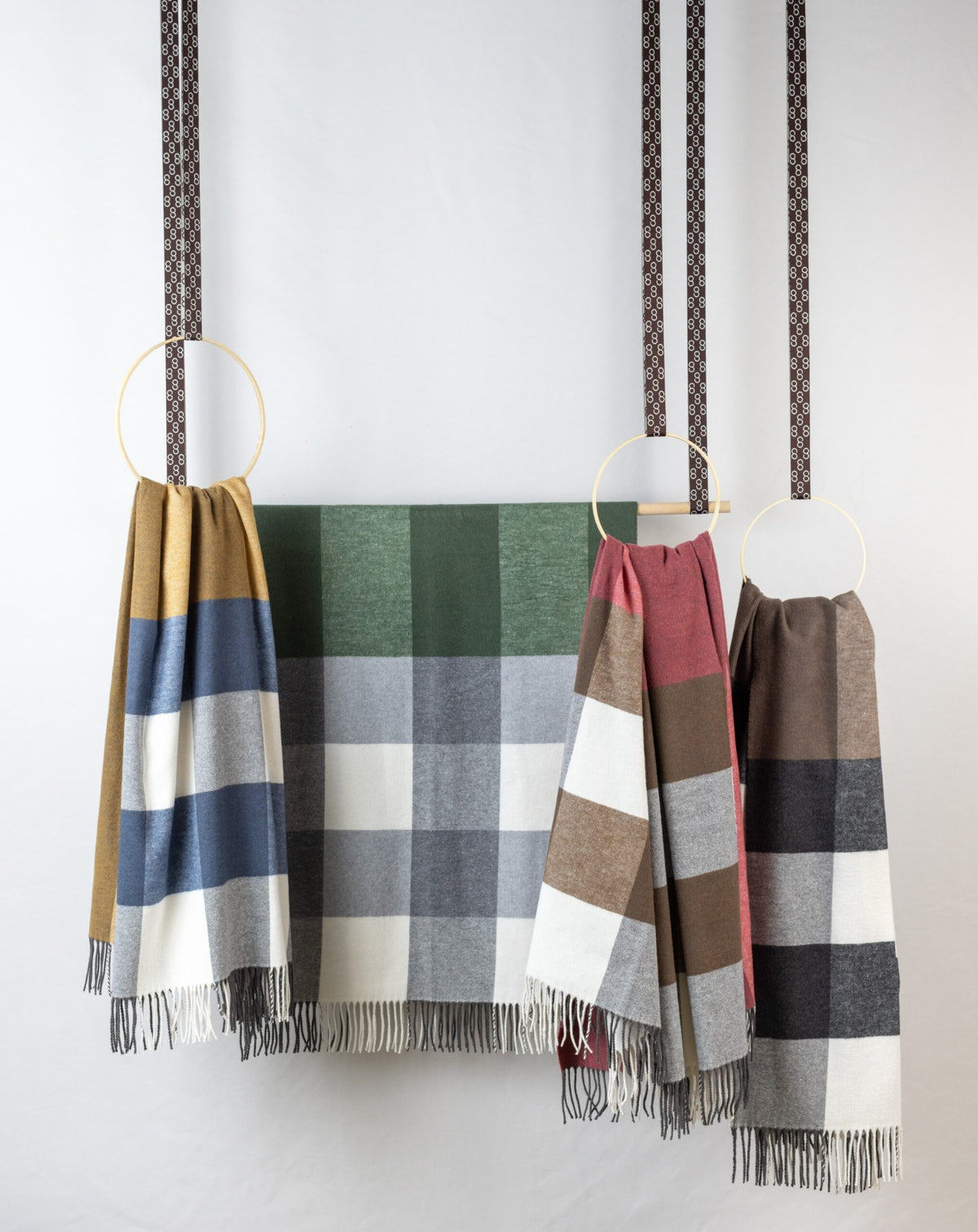 Plaid Balmoral Coccoy ambientazione colori assortiti